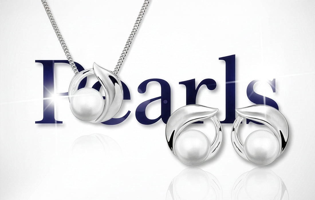 Колекция сребърни бижута с перли- колиета, обеци, гривни