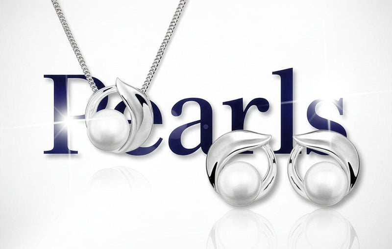 Колекция сребърни бижута с перли- колиета, обеци, гривни