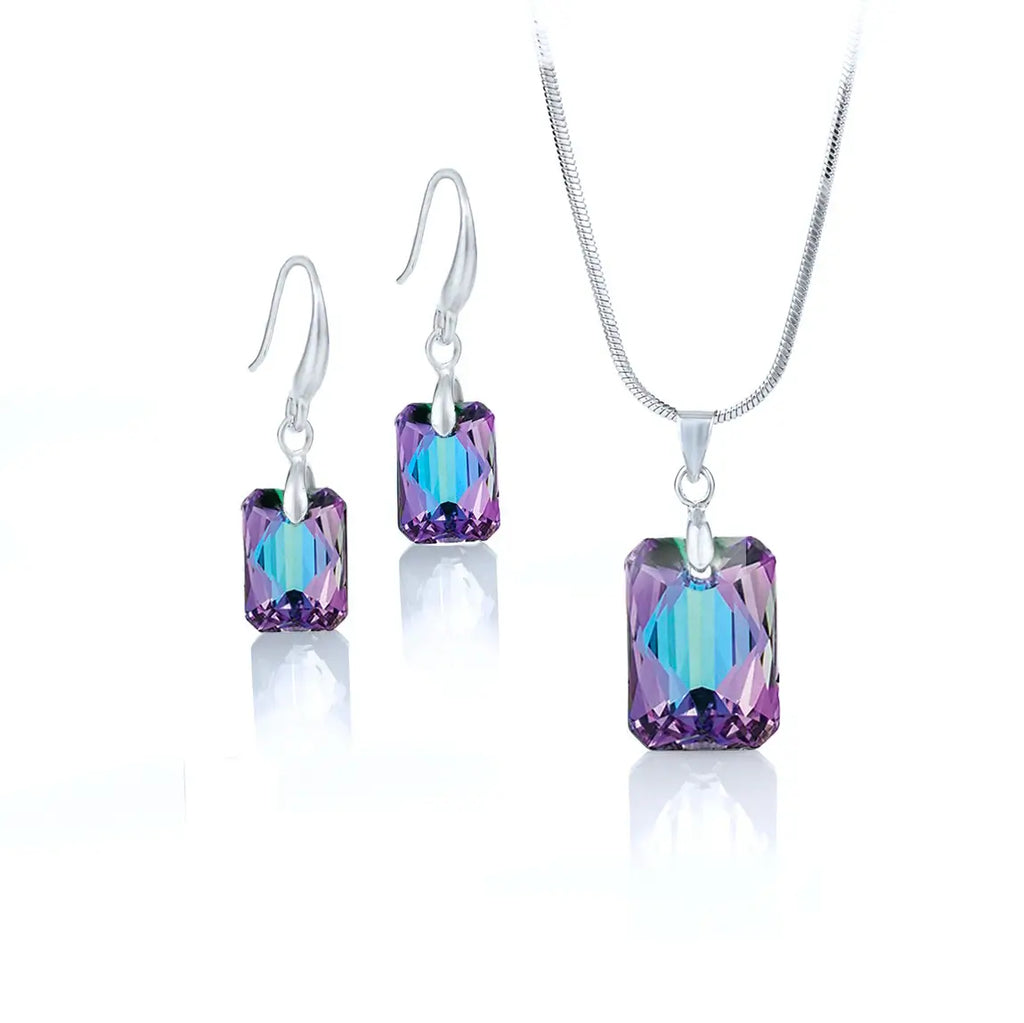 Изискано колие с обици emerald cut  в правоъгълна форма в нежно преливащи лилаво-тюркоазени цветове с кристали Сваровски.